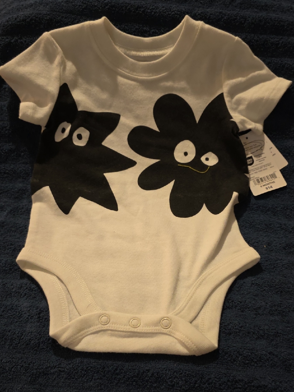okie dokie White Bodysuit with Black Flower Faces